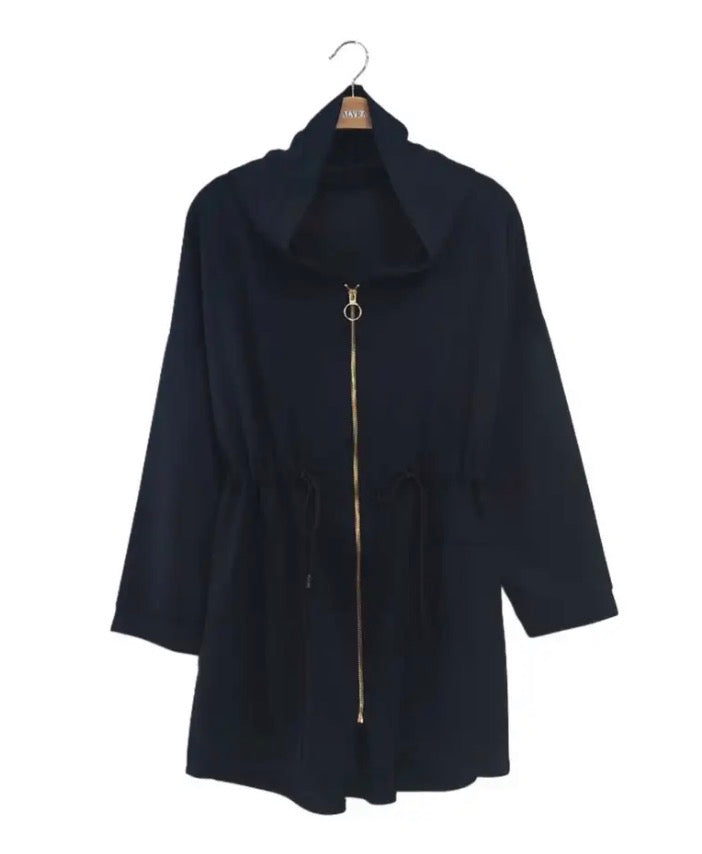 Navy blue coat on a hanger against a white background