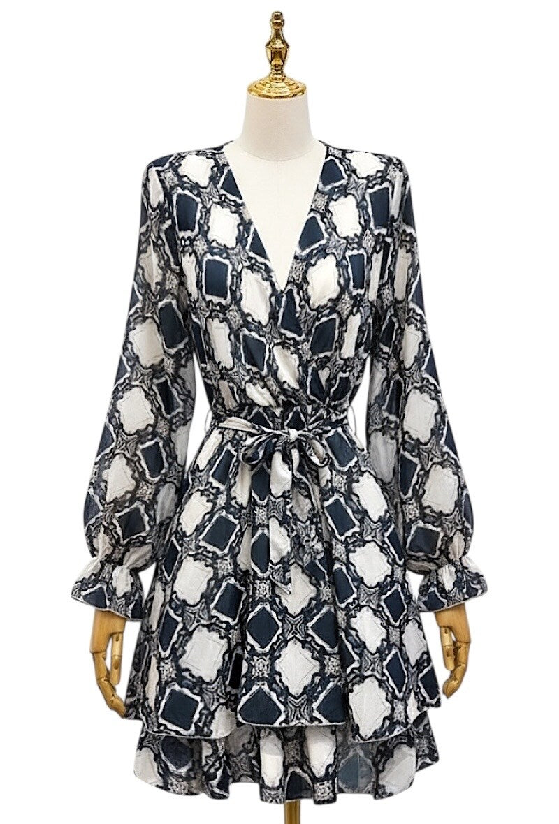 Patterned Sasha Print dress on a mannequin with a white background
